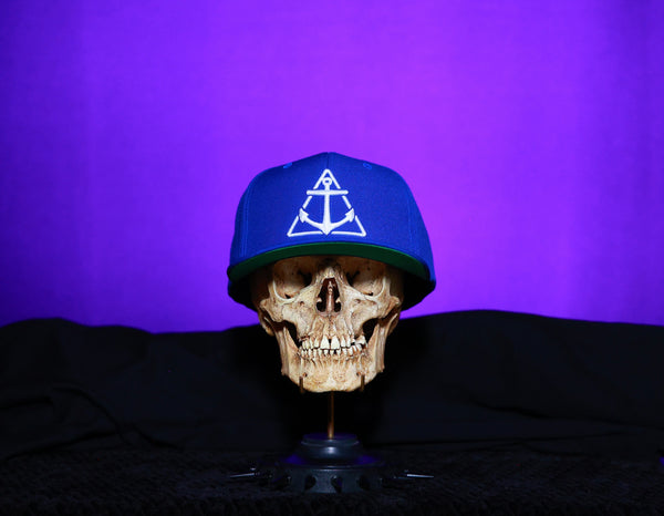 Blue with White logo Flat Bill Hat- Green under cap.