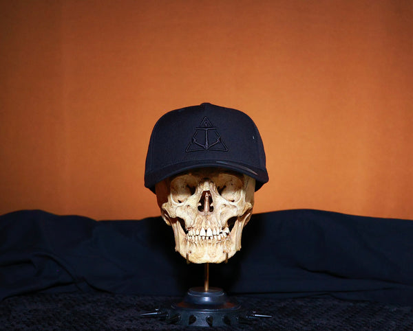 Black on Black logo curved bill Hat